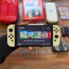 SWITCH OLED COM CUPOMMM Nintendo Switch OLED + Super Mario Bros. Wonder + 3 Mese…