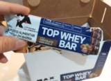 💪 Max Titanium Top Whey Bar Chocolate e Avelã -…